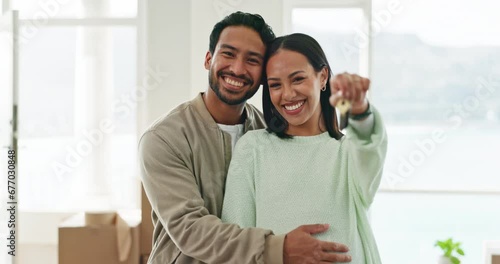 Happy couple, real estate and hug with keys for new home, property or dream investment together. Portrait of man and woman owners for moving in, goals or mortgage loan in happiness for buying house photo