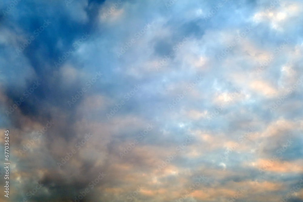 Naklejka premium Dark clouds in a dramatic sky. Storm clouds of deep blue color