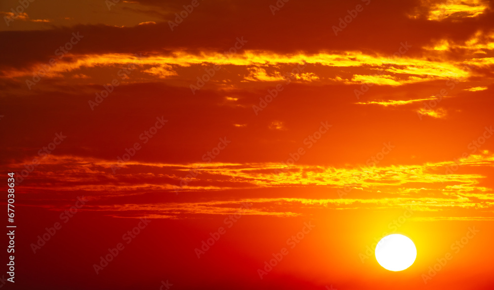 Golden sunset on the sky with clouds Golden sunset on the sky with clouds