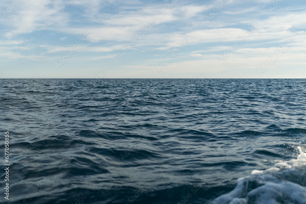 Fototapeta premium Sea travelling background of empty horizon with sunny weather