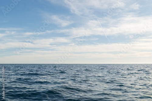 Sea travelling background of empty horizon with sunny weather © GCapture