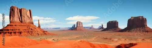 A Majestic Desert Landscape With Towering Mountains and Magnificent Rock Formations