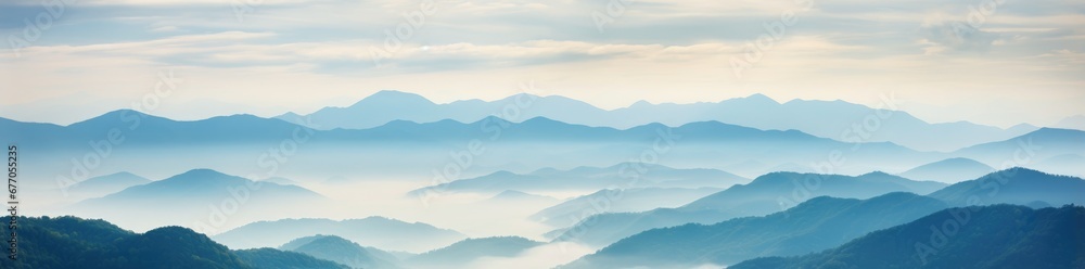 Majestic Peaks Hidden in Mystical Mist