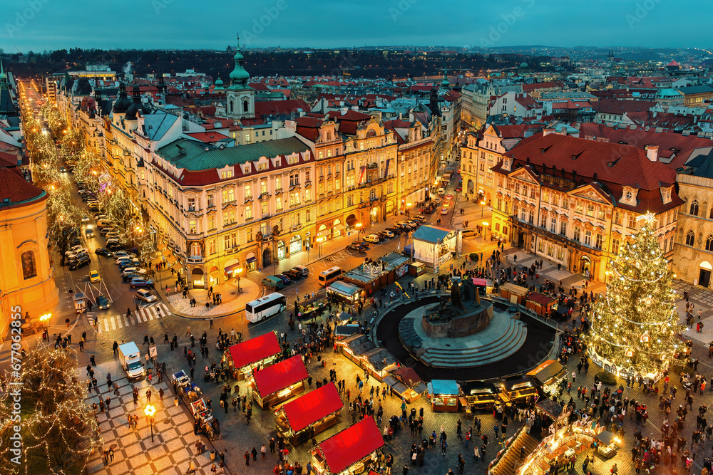 Aerial view of the famous Christmas market on the Old Town Square in Prague. - obrazy, fototapety, plakaty 