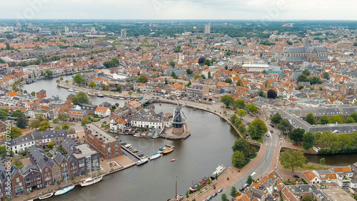 Haarlem, Netherlands. Windmill De Adriaan (1779). Windmill from the 18th century. Panoramic view of Haarlem city center. Cloudy weather during the day. Summer, Aerial View photo