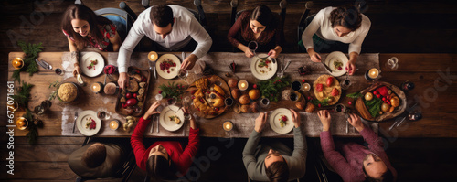 Top wiev of the family during taste Christmas Eve dinner.