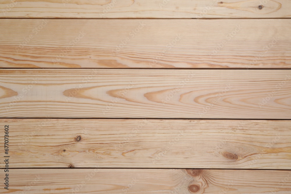 Fototapeta premium Texture of wooden surface as background, top view