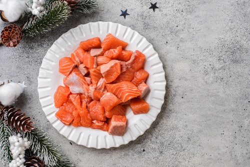 pieces of raw salmon in a Christmas
