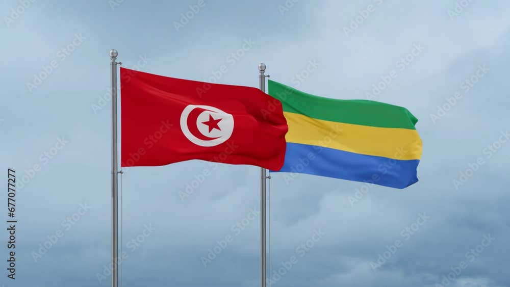 Gabon flag and Tunisia flag waving together on cloudy sky, endless seamless loop, two country relations concept Gabon flag and Tunisia flag waving together on cloudy sky, endless seamless loop, two country relations concept