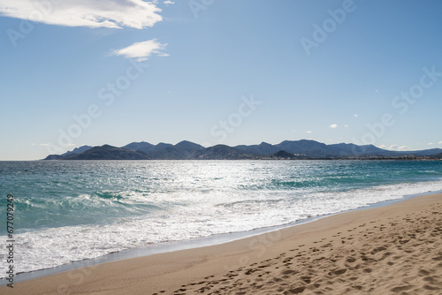 Sand beach of South France during spring with sea waves