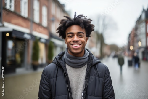 an europan africa black young man smile at camera in the city photo