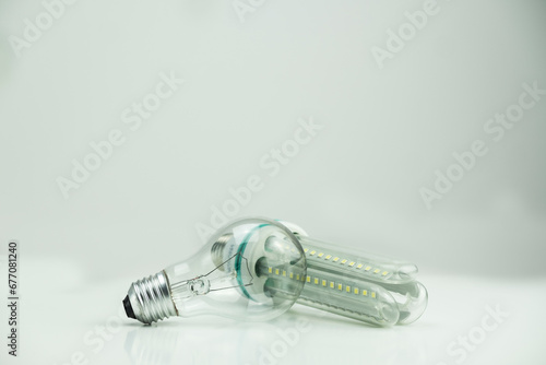LED bulb next to tungsten bulb