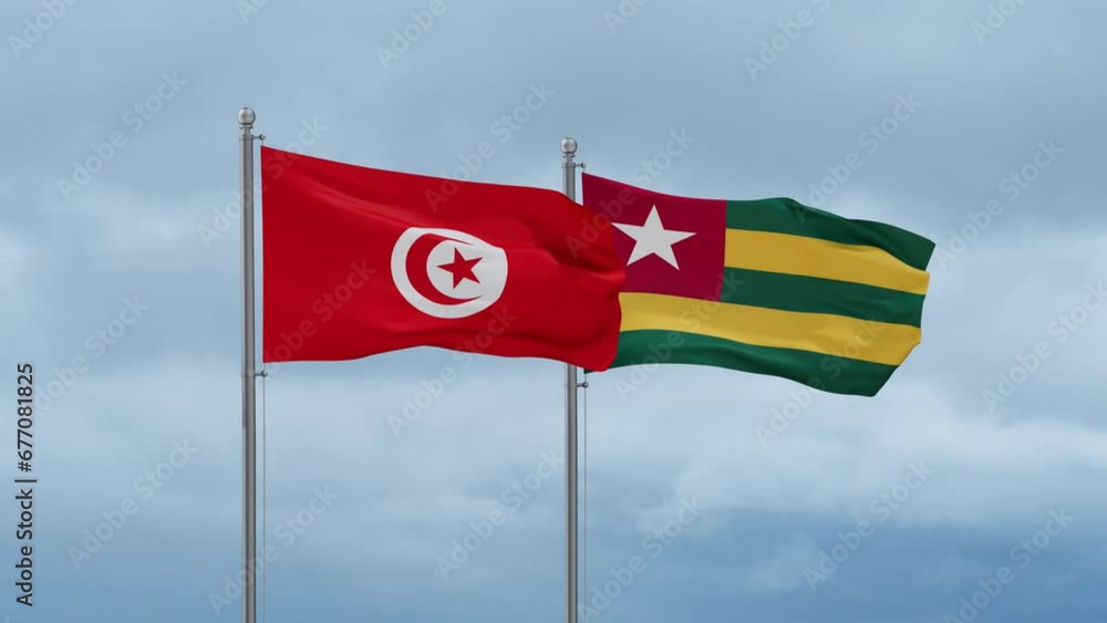 Togo, Togolese Republic and Tunisia flag waving together on cloudy sky, endless seamless loop, two country cooperation concept Togo, Togolese Republic and Tunisia flag waving together on cloudy sky, endless seamless loop, two country cooperation concept