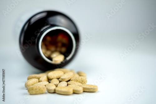 Detail of Open Jar of Vitamin Pills and Food Supplement