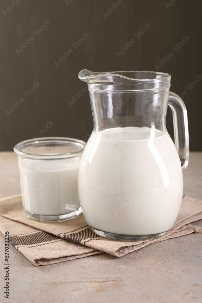 Glassware with tasty milk on light table Glassware with tasty milk on light table