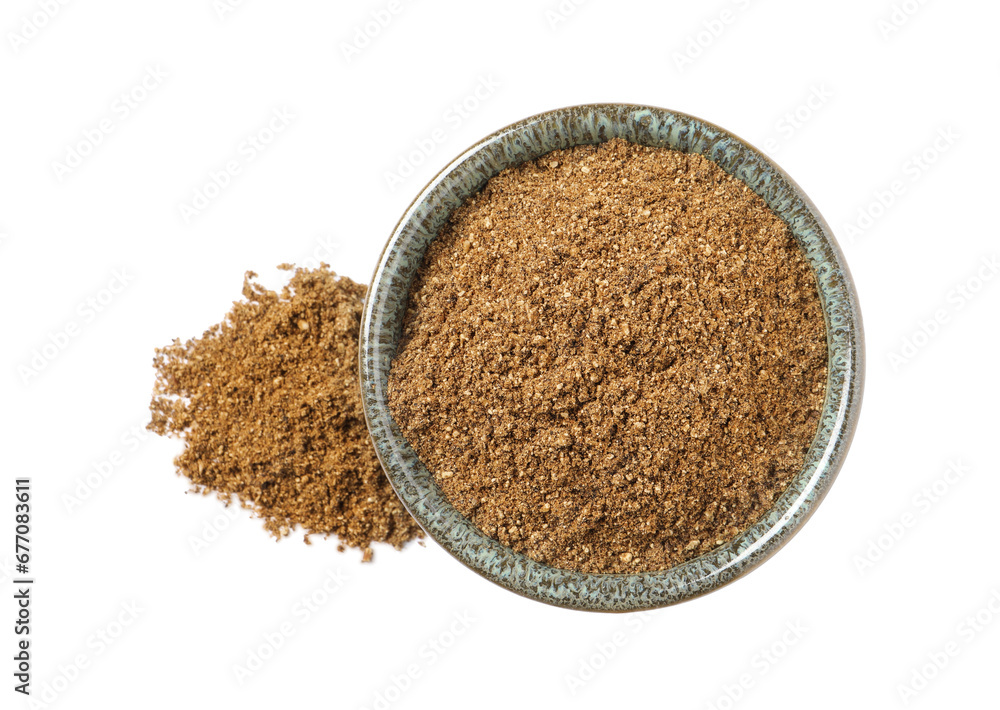 Bowl and aromatic caraway (Persian cumin) powder isolated on white, top view Bowl and aromatic caraway (Persian cumin) powder isolated on white, top view