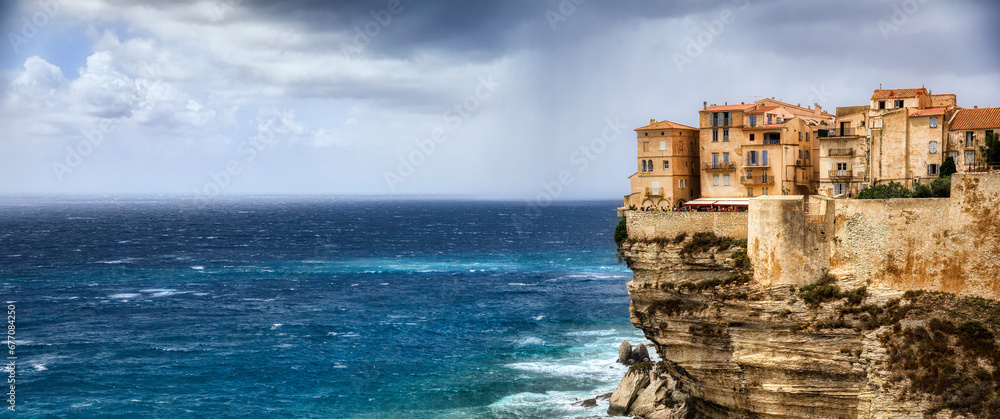 The Dramatic Cliff with the Old City of Bonifacio on the Southern Tip of Corsica, France The Dramatic Cliff with the Old City of Bonifacio on the Southern Tip of Corsica, France