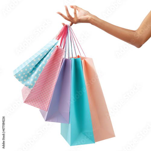 Female hand holding many shopping bag pink and light blue color. Isolated on white background
