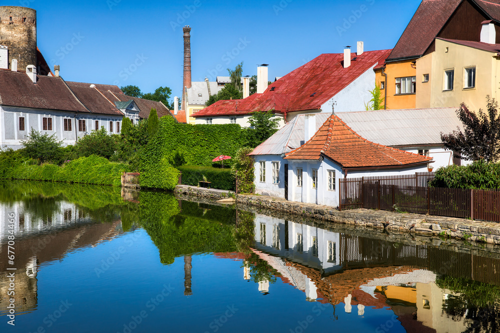 Houses Reflecting in the Vajgar Pond in the Hamersky Potok River at Jindrichuv Hradec in the Czech Republic