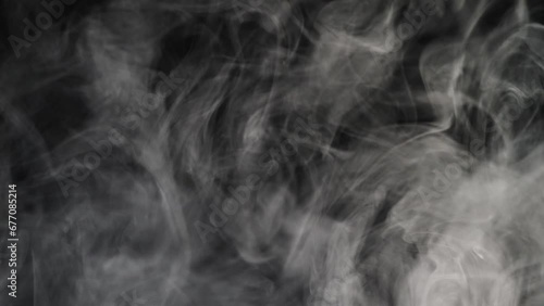  white smoke isolated on black background photo