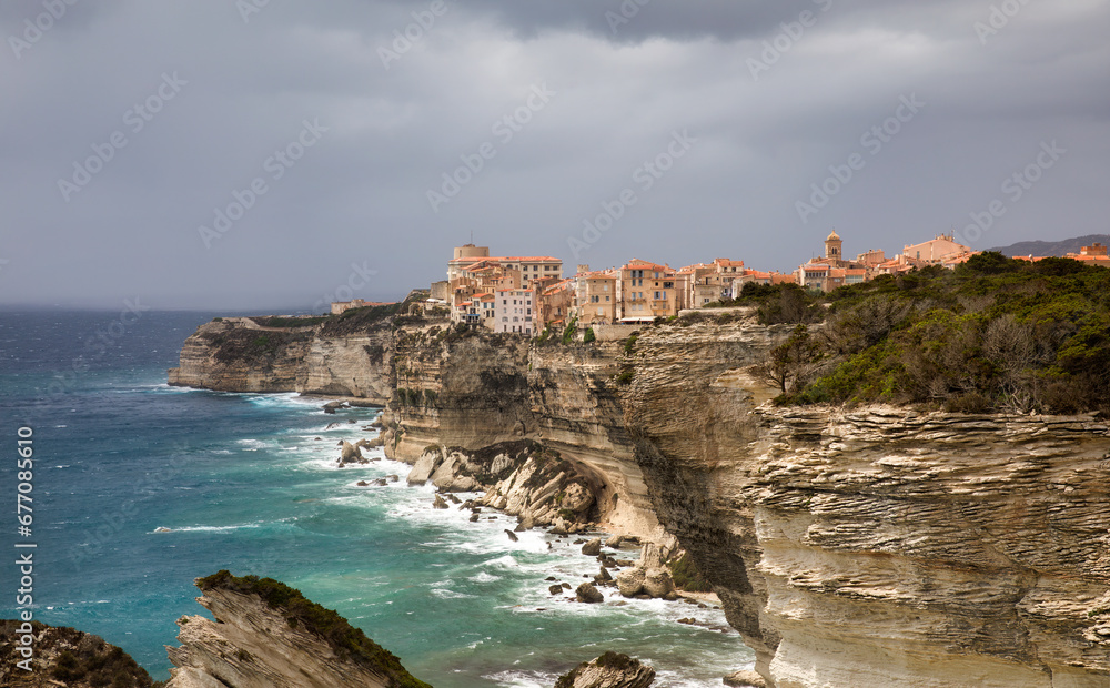The Dramatic Cliff with the Old City of Bonifacio on the Southern Tip of Corsica, France The Dramatic Cliff with the Old City of Bonifacio on the Southern Tip of Corsica, France