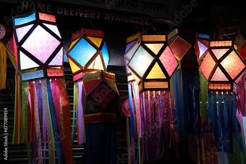 Hanging Diwali Lamp (Kandil) - Diwali Festival Background, Colourful lanterns made by paper eco friendly material akashkandil hang shop sell celebrating diwali festival in Pune, Maharashtra, India. photo