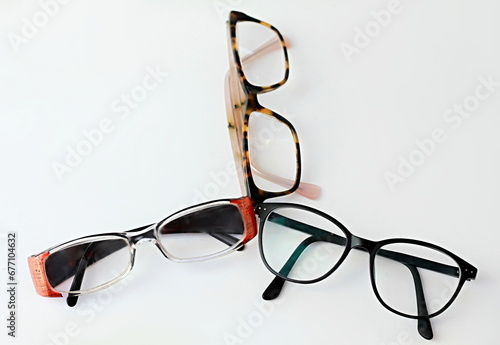 glasses on display at an optician shop no people on white background stock image stock photo