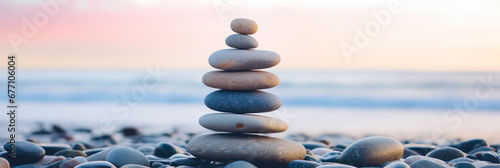 Zen stone tower with peaceful sea and sky bokeh photo