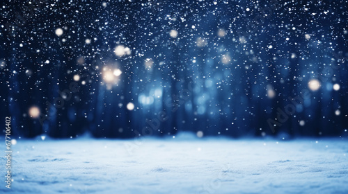 Winter snow background with snowdrifts, with beautiful light and snow flakes on the blue sky in the evening, banner format, copy space.