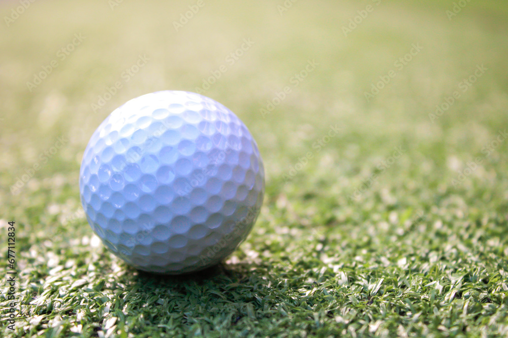 Golf ball placed on artificial grass. Golf ball placed on artificial grass.
