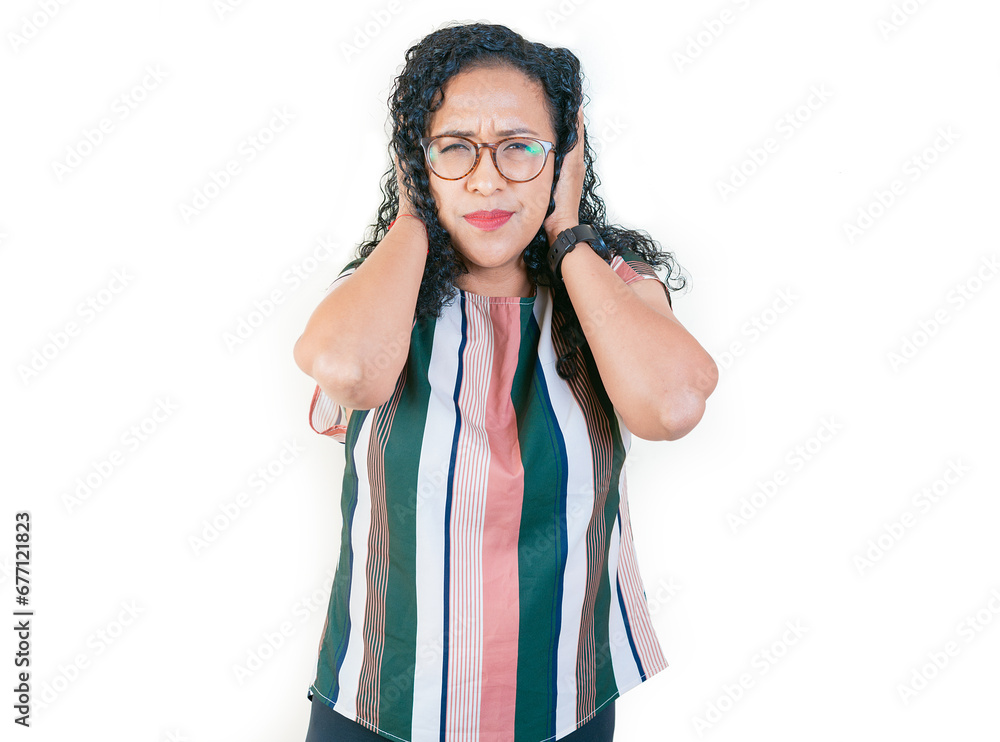 Displeased afro girl in glasses covering her ears isolated. Young afro woman covering her ears tightly Displeased afro girl in glasses covering her ears isolated. Young afro woman covering her ears tightly