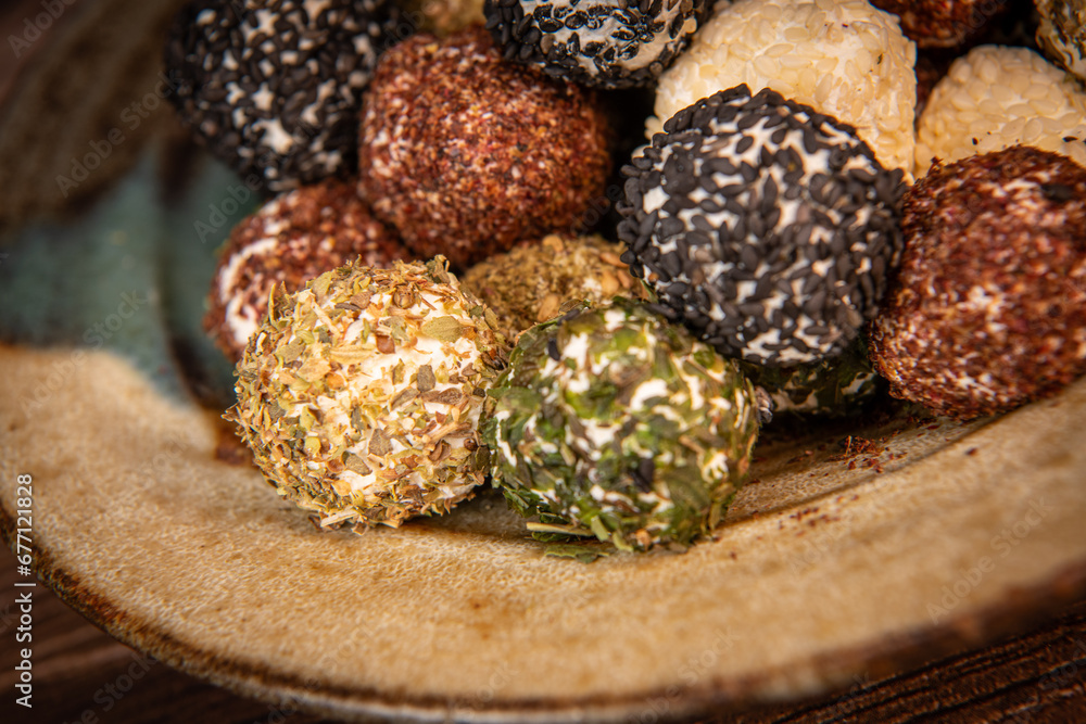 RECIPE FOR LABNEH CHEESE BOLLS WITH DRIED MINT, WHITE AND BLACK SESAME, SUMAC AND ZAATAR. High quality photo RECIPE FOR LABNEH CHEESE BOLLS WITH DRIED MINT, WHITE AND BLACK SESAME, SUMAC AND ZAATAR. High quality photo