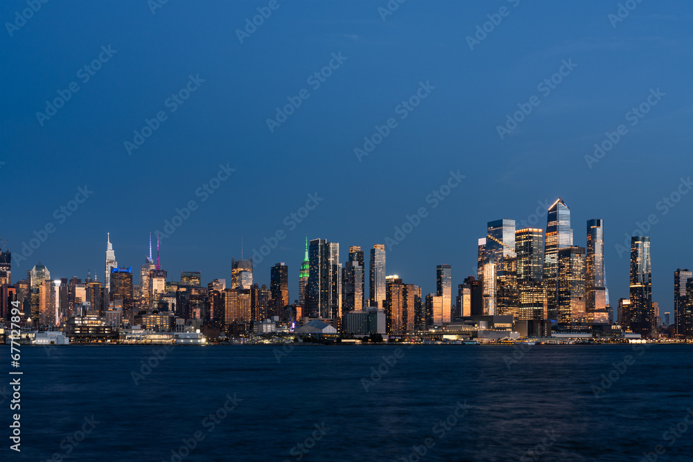 New York Manhattan west side skyline at night, panoramic view on skyscrapers