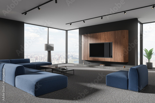 Gray and wooden living room corner with couch and TV