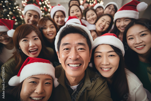 Group of happy friends in santa hat christmas at party. Celebration and holidays concept