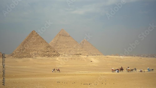 Ancient huge pyramids in the hot African desert on a sunny day photo