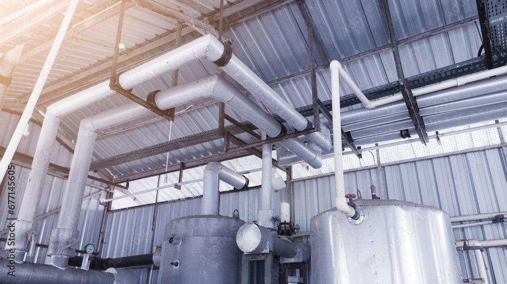 Industrial steel pipe and valves on the chiller installation. Industrial steel pipe and valves on the chiller installation.