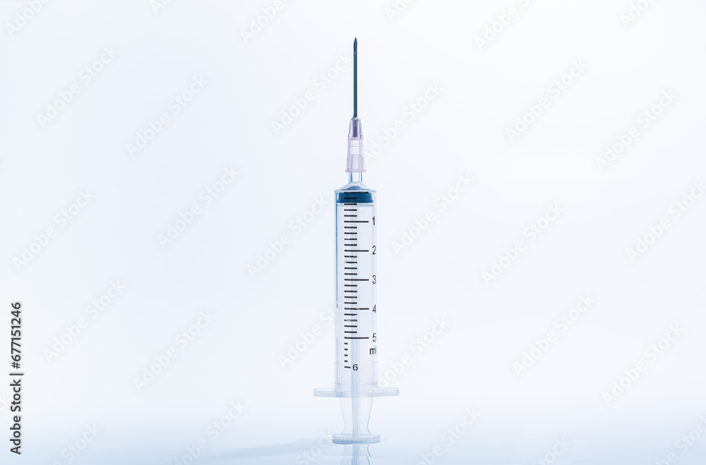 macro syringe,A 5ml syringe and needle isolated on a white background with detailed clipping path,Close up of a syringe. Focus on numbers. macro syringe,A 5ml syringe and needle isolated on a white background with detailed clipping path,Close up of a syringe. Focus on numbers.