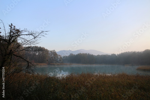 Early morning scenery of Bentennuma pond and autumn leaves in Goshikinuma, Urabandai, Fukushima, Japan