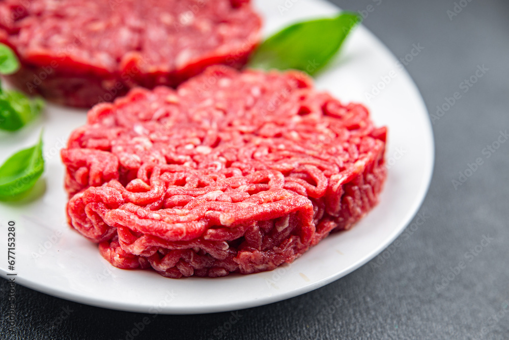 cutlet raw meat beef burger eating cooking appetizer meal food snack on the table copy space food background rustic top view cutlet raw meat beef burger eating cooking appetizer meal food snack on the table copy space food background rustic top view