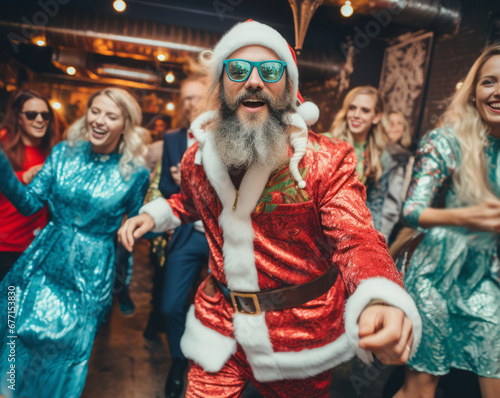 Man wearing Santa Claus costume on christmas party. People dance and have fun. Festive and celebration concept. Winter holidays theme