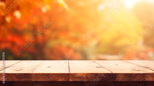 Concept Autumn nature and product advertising. copy space. The empty rustic wooden table for product display with blur background of autumn forest. Exuberant image. . background of autumn landscape. photo