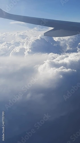 Avião sobrevoando acima das nuvens, no Peru photo