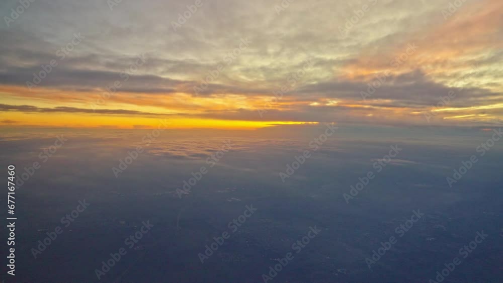Sunset through airplane window Sunset through airplane window