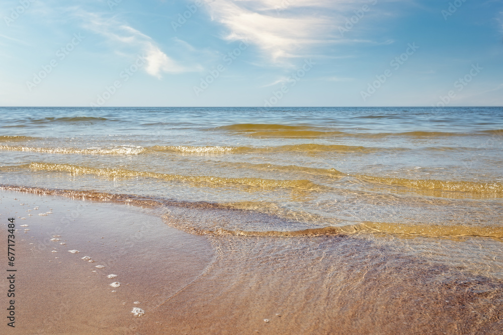 Beach sand and sea waves background. Travel and holiday concept. Beach sand and sea waves background. Travel and holiday concept.
