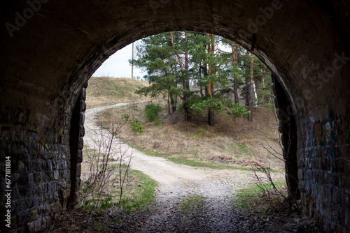Exit from the old road tunnel under the railway embankment
