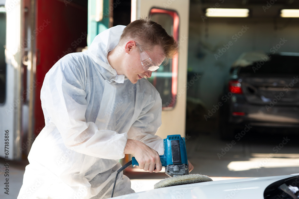 custom made wallpaper toronto digitalHands with orbital polisher. Car polishing waxing. Auto mechanic car man worker working painting in car paint chamber. Body paint garage