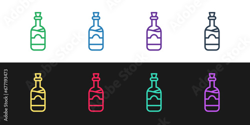 Set line Bottles of wine icon isolated on black and white background. Vector