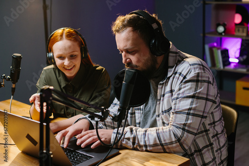 The radio host reads listeners' questions to the studio guest. Online media concept.