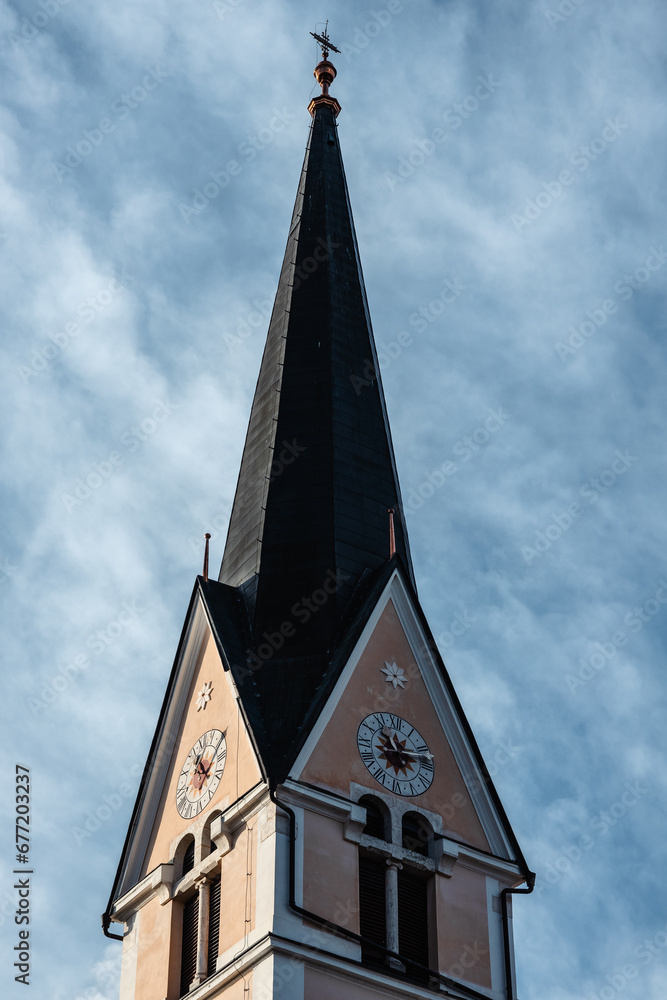 church steeple against blue sky